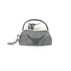 Image of the grey purse with a fur long horn cut out.