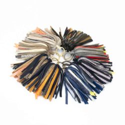 Pictures of leather keychain in a shape of a palm tree handmade by elphile.