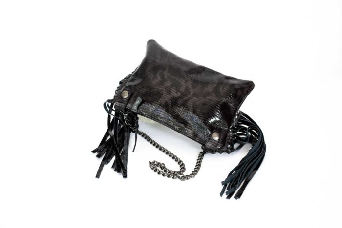 Image of the shiny black chained clutch.